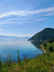 Summer landscape with mountains and reflection on Circum-Baikal Railway