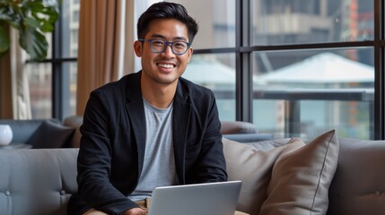 The smiling professional with laptop