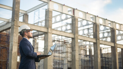 an architect engineer inspecting the building construction and check the progress of the construction plan, the foreman inspecting the building construction