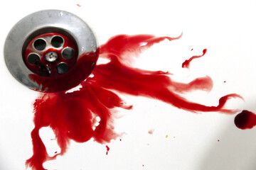 blood stains on the white sink, blood stains on the sink