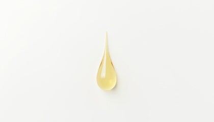 Fototapeta premium A single drop of golden liquid
