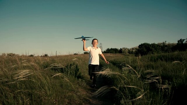 A joyful boy runs through a sunlit field with a toy airplane, embodying the essence of childhood dreams and outdoor play. Ideal for themes of aspiring to be a pilot and carefree days.