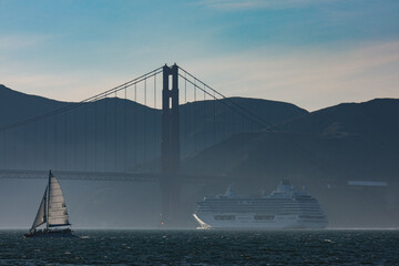 Luxury cruiseship cruise ship liner Serenity sail away departure from San Francisco port through...