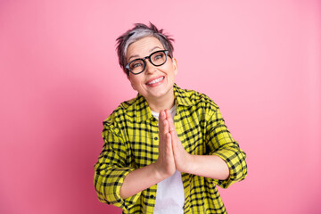 Photo of nice aged woman arms plead checkered shirt isolated on pink color background