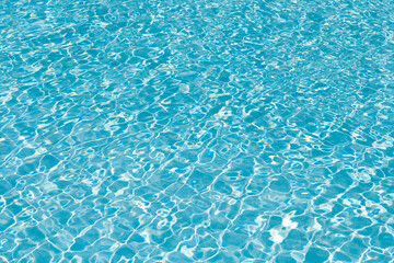 Obraz premium Sea water surface background on summer vacation resort background of ocean beach