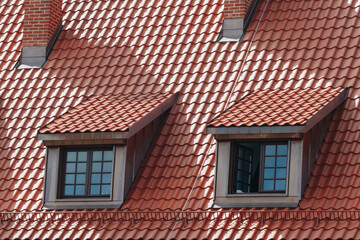 small windows in the attic - dormer window 