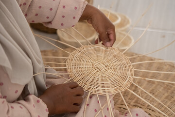 Indonesian craftsmen make household furniture from rattan
