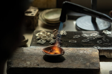 The process of making jewelry by a craftsman