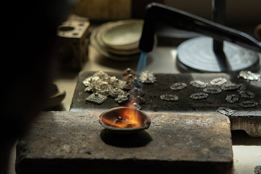 The process of making jewelry by a craftsman