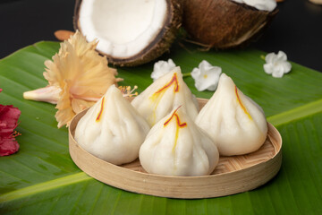 Steamed Modak, white modak, ukdiche modak made from rice flour and coconut jaggery filling. Modak is a traditional Indian sweet made during Ganesh Utsav