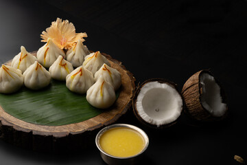 Steamed Modak, white modak, ukdiche modak made from rice flour and coconut jaggery filling. Modak...