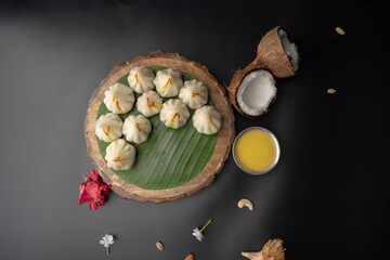 Steamed Modak, white modak, ukdiche modak made from rice flour and coconut jaggery filling. Modak...