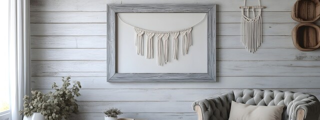 Mockup frame in a cozy farmhouse inspired living room with gray washed wooden frame shiplap walls tufted armchair and a beautiful macrame wall hanging all in a 3D render