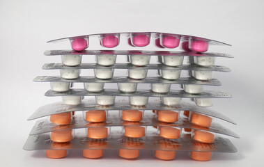 close up of medicine tablets in blister packaging on the white background