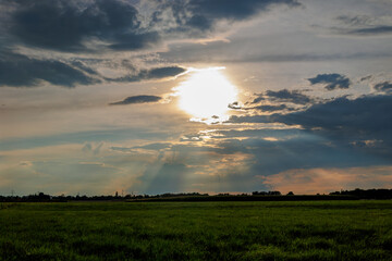 Sunset over the fields near K&ouml;nigsbrunn in a cloudy sky