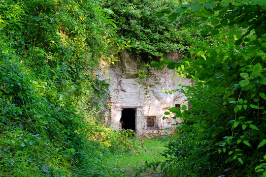 Ruins of old cave dwelling in the hillside of Marigny-Brizay village