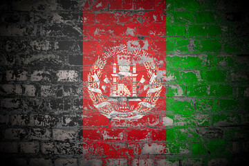 Flag of Afghanistan on brick wall