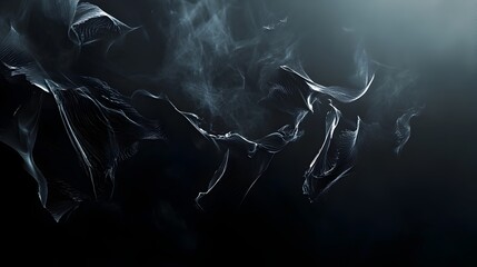 Conceptual image of abstract dark shapes organically forming and floating in midair with a soft glow illuminating the edges and creating a moody atmospheric vibe