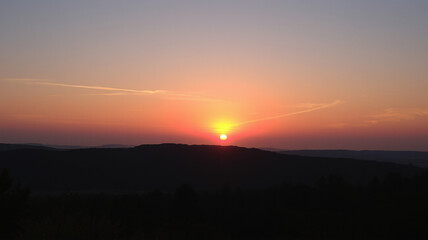 Obraz premium beautiful sunset over the hill,calm,relaxing