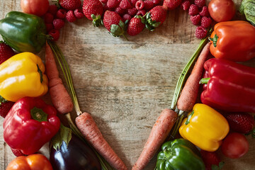 Health, heart shape and produce with fruit for diet, nutrition and organic snack. Vegetables, wellness and ingredients with vitamins for antioxidants above kitchen countertop for vegetarian wellbeing