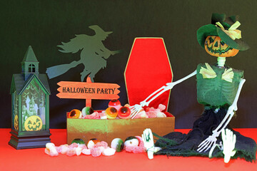 Halloween coffin full of candy sweets. Halloween party.