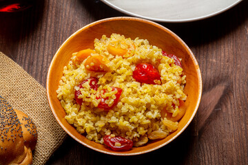 Bulgur with dried fruits on the festive table for the meal on Rosh Hashanah