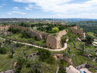 Obraz premium view of old military castle in loess plateau in shanxi