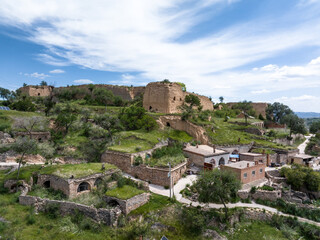 Obraz premium view of old military castle in loess plateau in shanxi