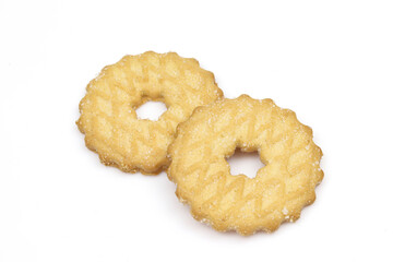 Two ring shaped round biscuits with star shaped holes isolated on white background