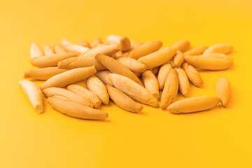 Heap of Spanish mini picos on yellow