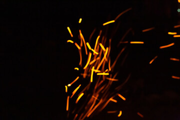 Orange fire pit in the wood