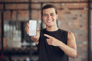 Phone screen, point and portrait of man in gym for fitness app, membership and software download. Happy, person and tech with mockup space for training program, exercise and online registration info
