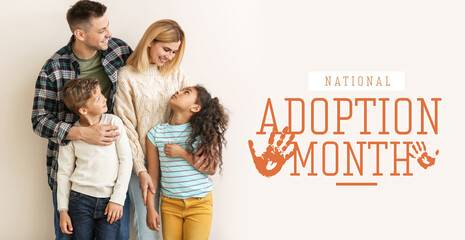 Happy couple with little adopted children on white background