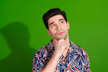 Photo of minded guy with bristle stylish haircut dressed print shirt thoughtfully look empty space...