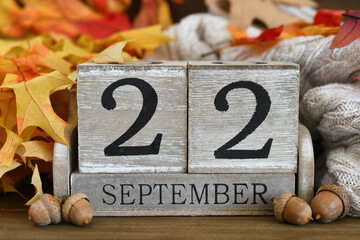 First Day of Autumn, Fall Season aka Autumnal Equinox or solstice - September 22 on a wooden block calendar 