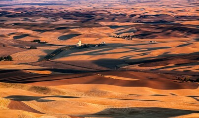 A patchwork of wheat stubble fields in the fall in the palouse wheat country in southeastern Washington.