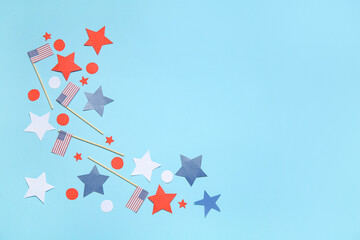 Composition with USA flags and stars on blue background. Independence Day celebration