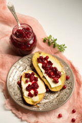 Cornbread with butter and lingonberry jam