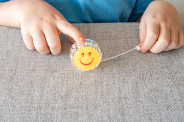 Yoyo toy in the hands of a child.
