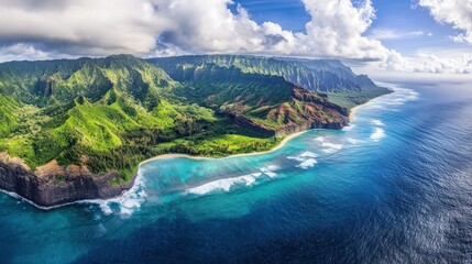 Aerial View of Lush Green Mountains Meeting the Azure Ocean with White-Capped Waves