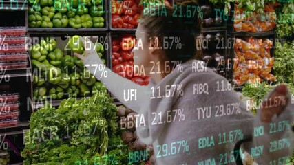 Picking vegetables in grocery store, financial data animation over fresh produce - Powered by Adobe