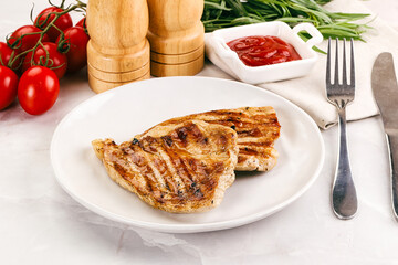 Grilled pork steak with sauce