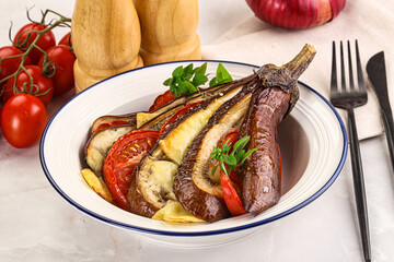 Baked tomato with mozzarella and tomato