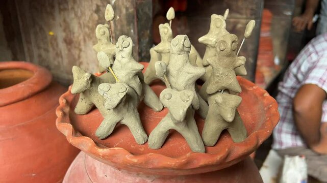 Clay idols or puppets Hastar in a pottery shop for Janmasthami celebration.