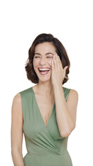 Woman Wearing Green Dress Laughs With Hand on Cheek