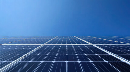 close up of solar panel cells under clear blue sky