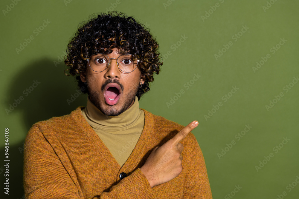 Sticker photo portrait of handsome young guy point shocked empty space dressed stylish brown garment isolate