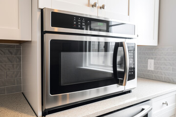 Fototapeta premium generated illustration of modern white and black microwave in a house kitchen on the kitchen table
