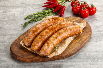 Raw sausages with spices and herbs