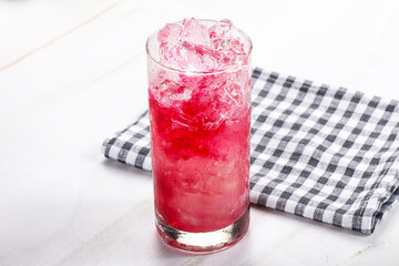 Cold strawberry cocktail with ice